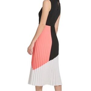 Beautiful dress size 12 mock-neck skirt is not lined but it’s not see through.